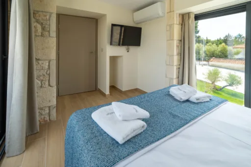 Double bedroom with elegant wooden floors