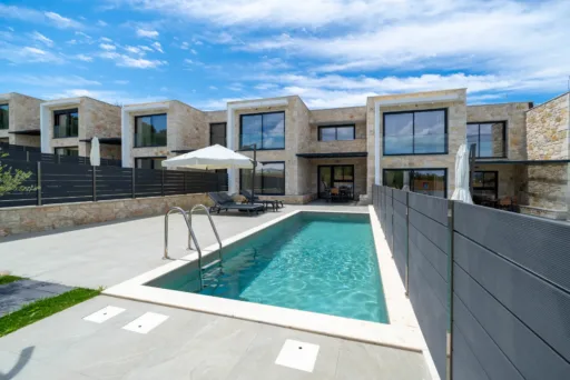 Private pool and green garden area at Villa Elia vacation rental