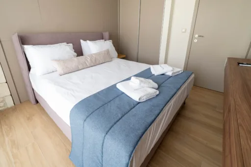 Bright double bedroom with wardrobe and natural light