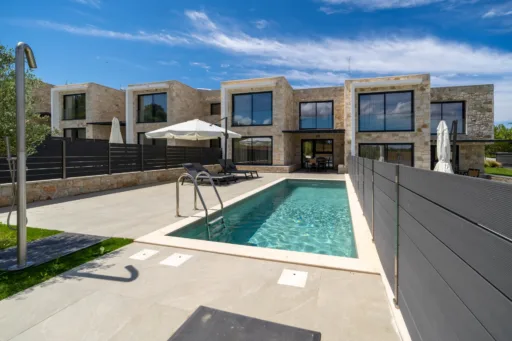 Exterior view of Villa Lithos featuring a private pool and sun terrace in Halkidiki
