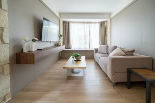 Living room with comfortable sofa and smart TV
