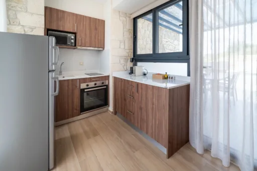 Modern kitchen with wooden cabinets and stainless appliances