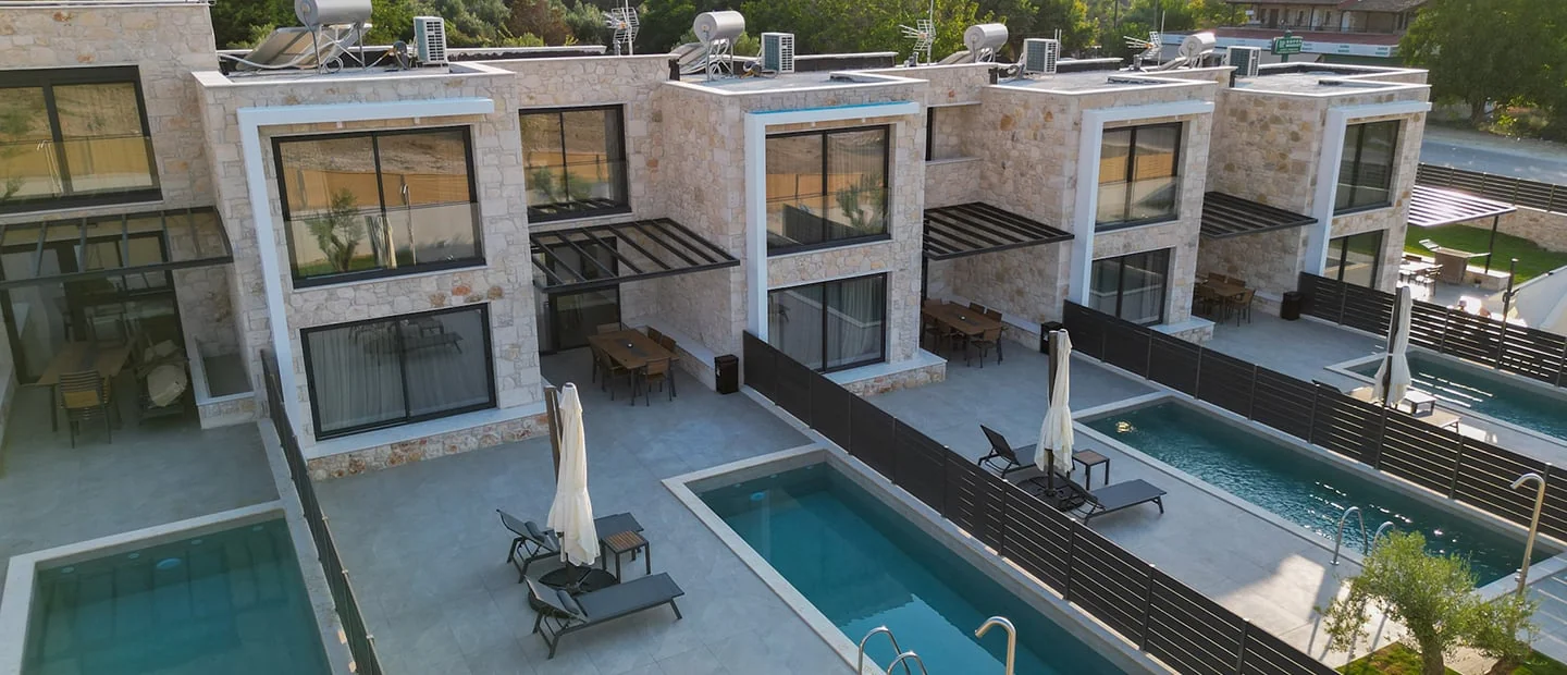 Aerial photo of The Olive Path Villas in Poseidi featuring private swimming pools